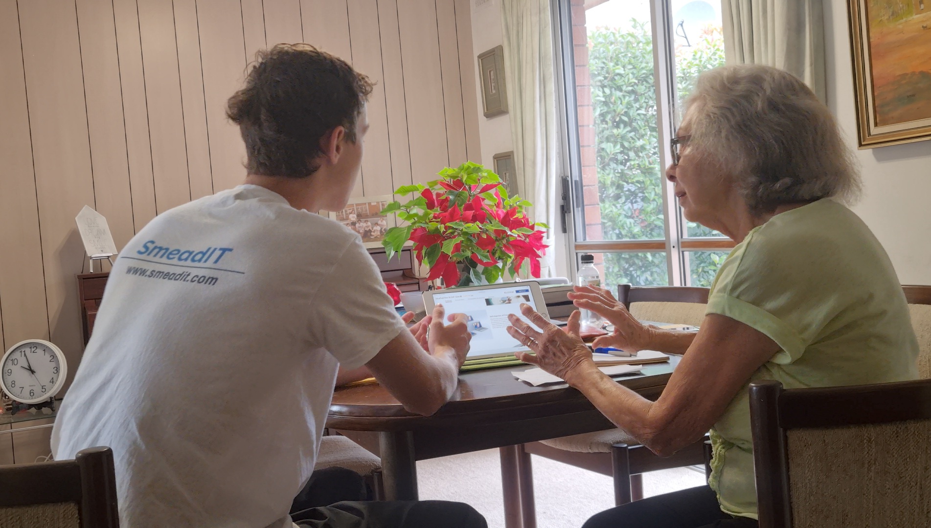 Darcy helping his grandmother with computer